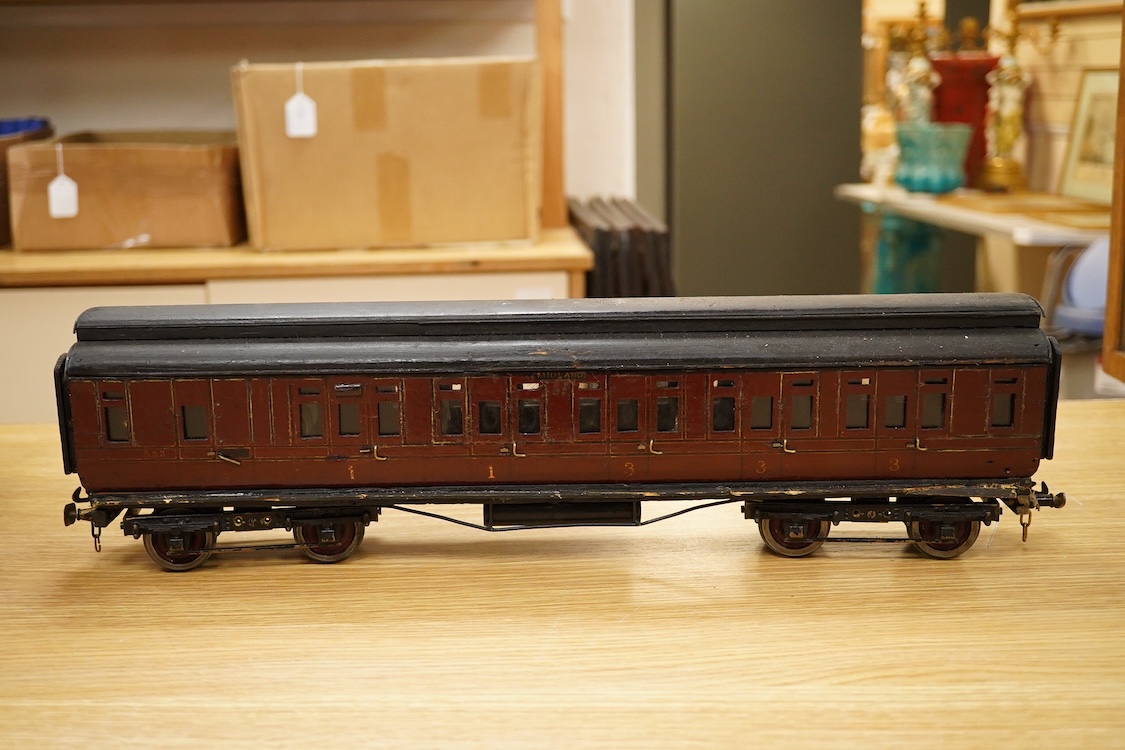 Two Gauge One bogie coaches; a Midland Railway clerestory coach, together with a 12-wheel Pullman car (bogies af), plus an American outline caboose, some scratch building and adaptation from kits, etc.